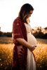 Maternity photoshoot in a field
